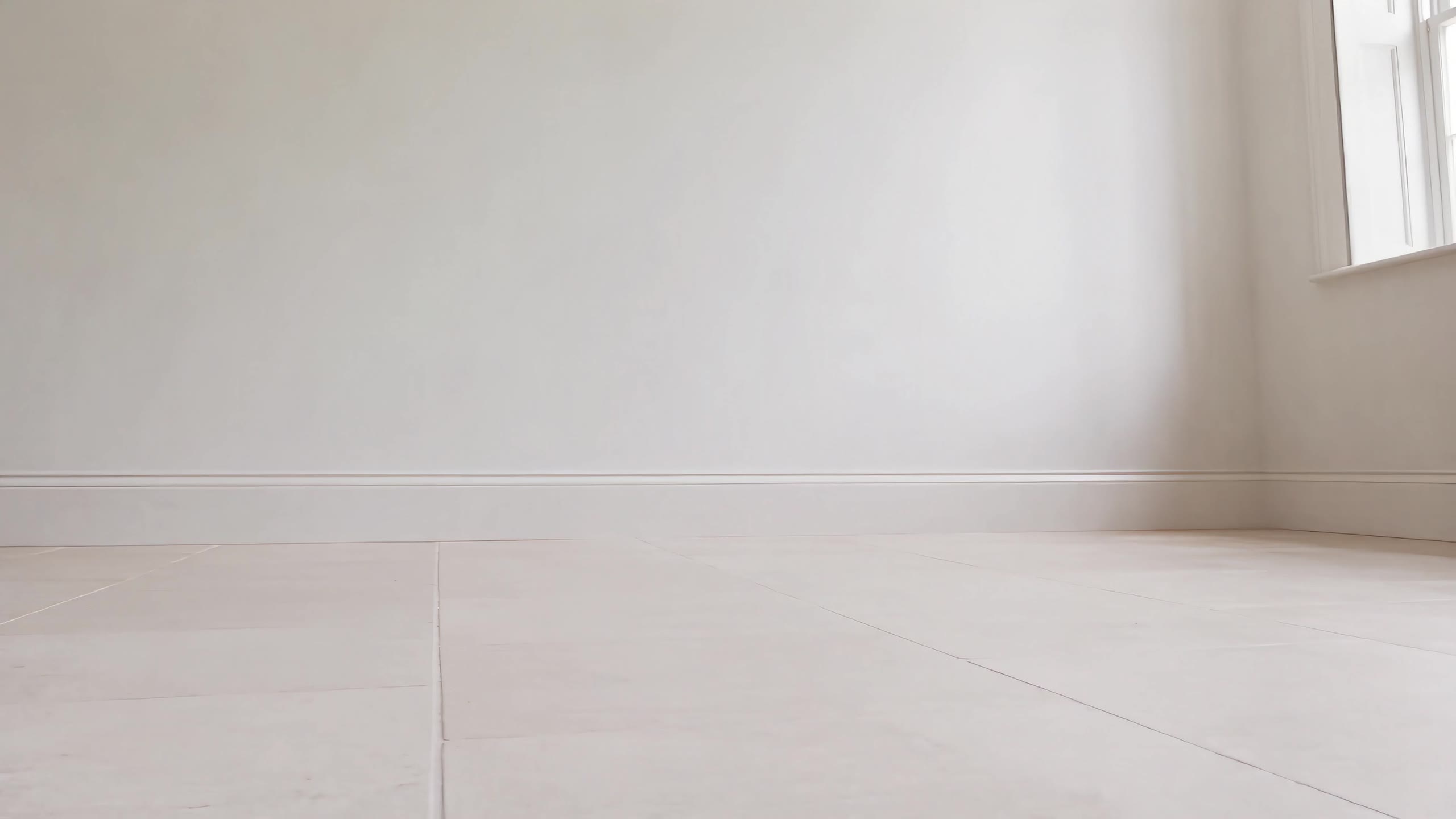 An empty, unfitted room with stone floors, waiting for a Forest & Stone kitchen