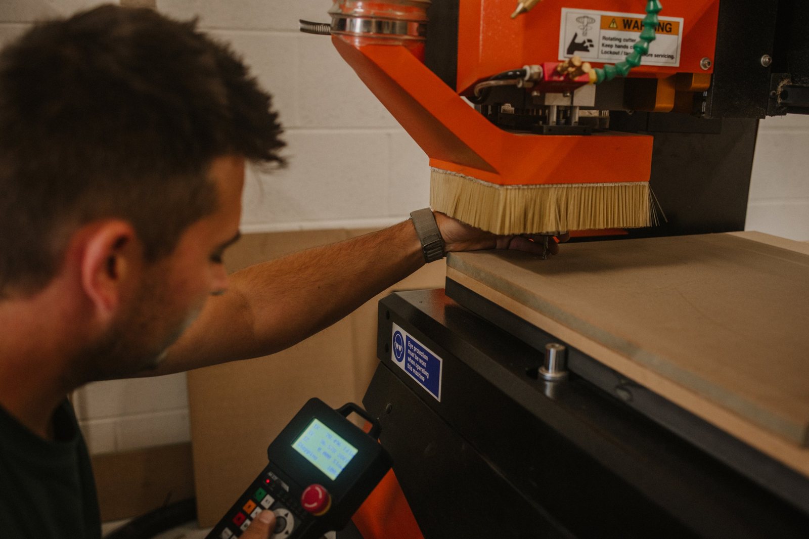 Setting the cutter height on the CNC router with its handheld controller